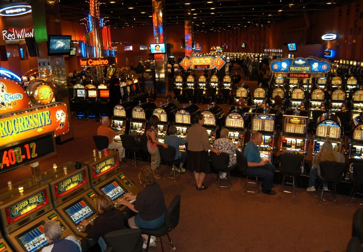 People playing slots.