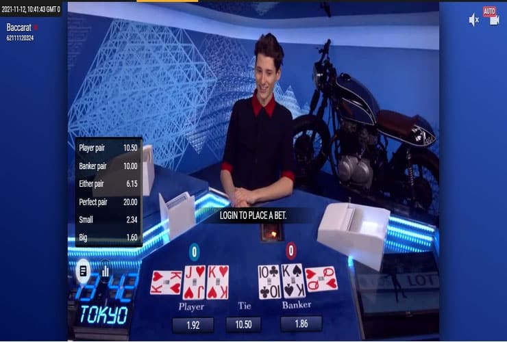 Croupier dealing cards at a Gigadat Casino