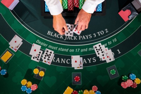 Blackjack table with chips and cards on it