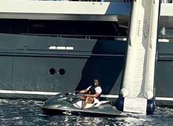 NBA Hall of Famer Magic Johnson has a blast on jet ski during summer vacation in Greece