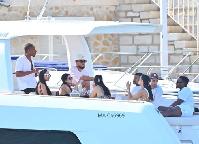 Suns star Devin Booker hosts summer yacht party with bikini-clad girls