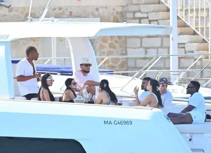 Suns star Devin Booker hosts summer yacht party with bikini-clad girls
