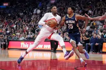 RJ Barrett drives against Trey Murphy