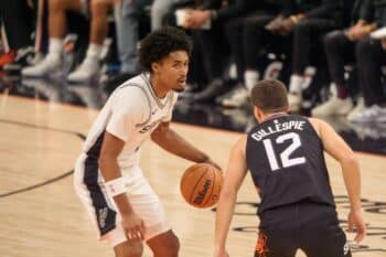 Dylan Harper dribbles against Suns